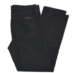 Calvin Klein Black Mid Rise Skinny Jeans size 31 / 12